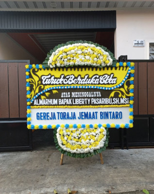 Papan Bunga Duka di Teluk Binjai
